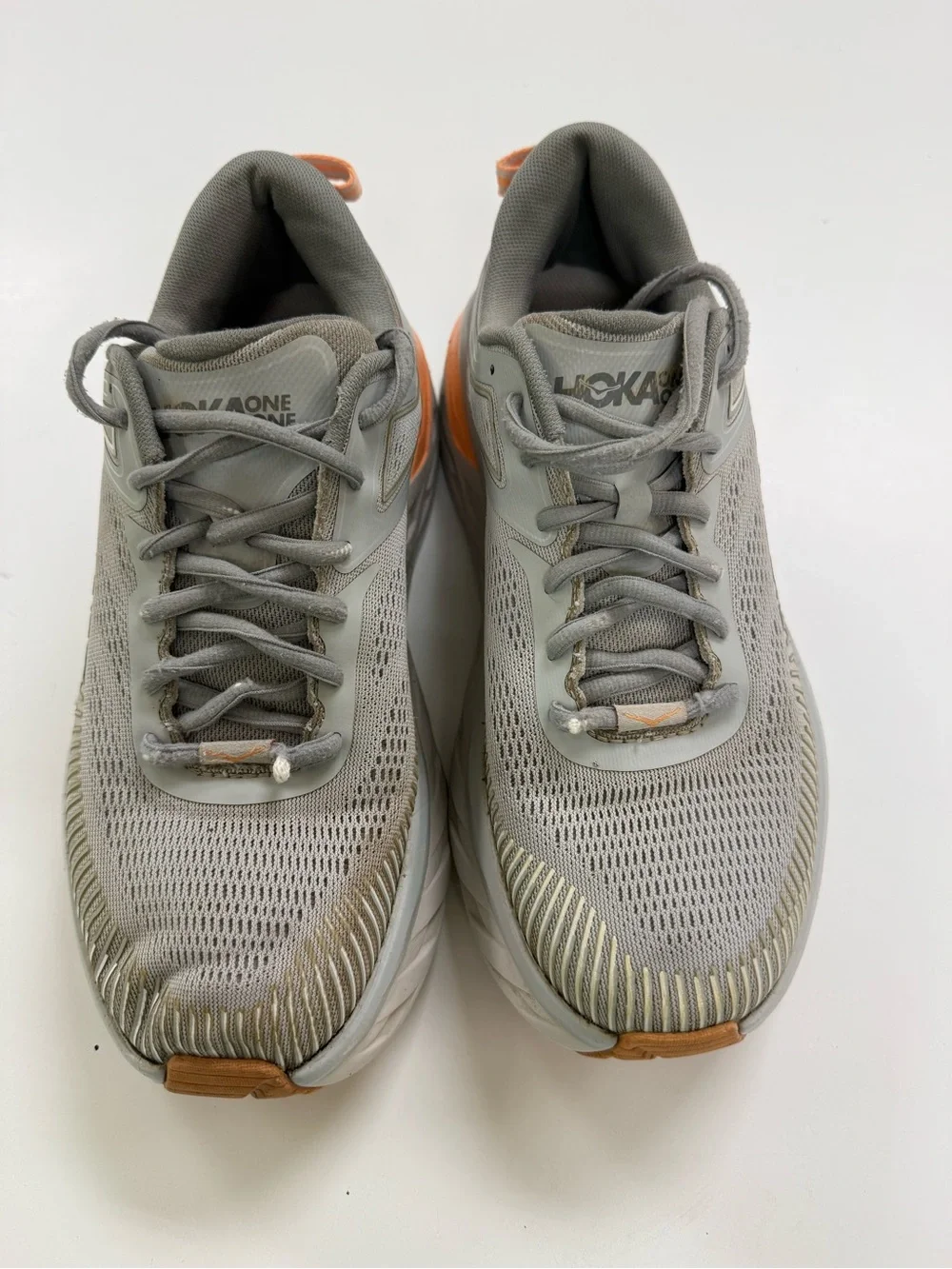 Hoka One One Men's Light Gray Running Shoes with Orange Accents